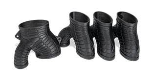 Un adaptador de colector hecho a partir de la Figura 4 RUBBER-BLK 10 