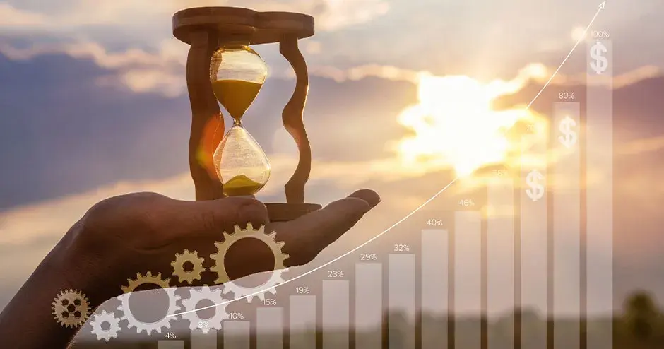 una mano que sostiene un reloj de arena 