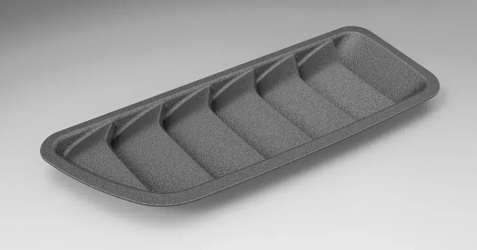 Una rejilla "tiburón" impresa en 3D con calidad de nivel de producción y un acabado texturizado de la superficie.