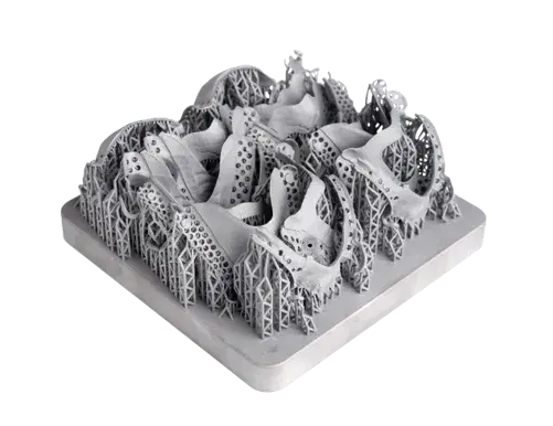 Piezas dentales DMP impresas en 3D en una bandeja