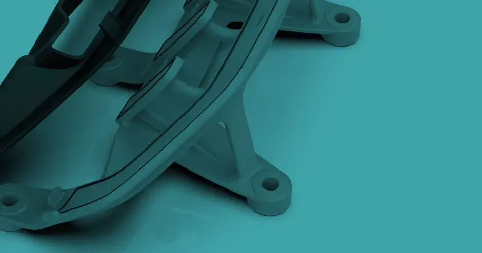 Fixtura de producción que utiliza un vacío para sostener e instalar piezas de vehículos sin marcar las superficies.